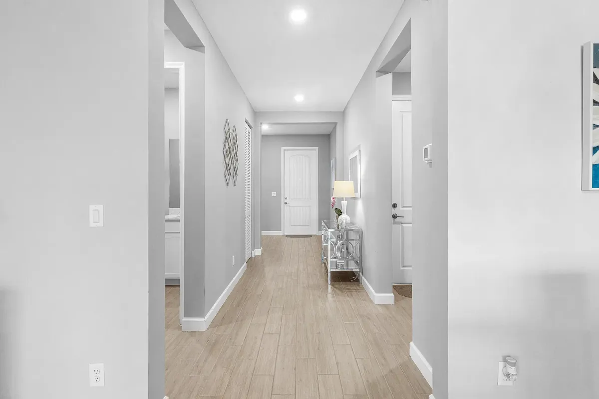 Interior hallway connecting the bedrooms to the main living area