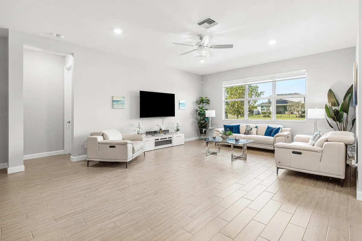 Living room with wall-mounted TV and open sightlines across the main level